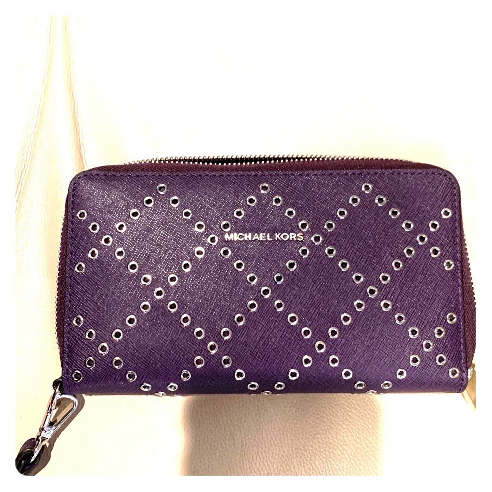 Michael Kors purple grommet wristlet